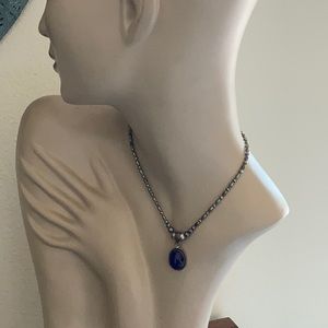 Artist made silver beaded necklace.